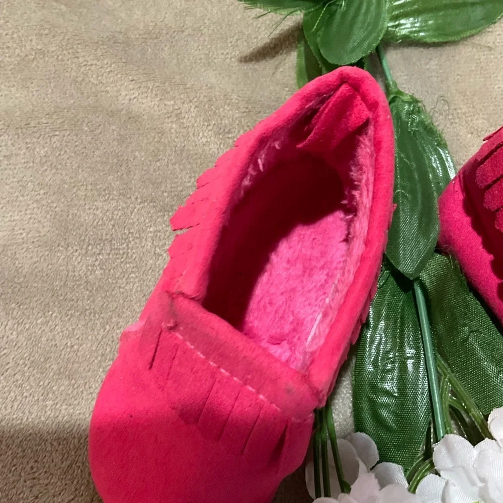 Child of Mine Pink Fringed Baby Moccasins with fleece lining.